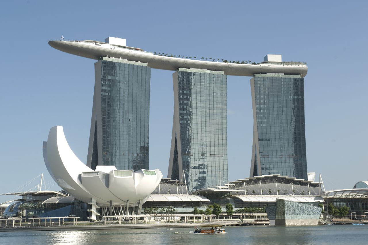 <strong>Height</strong>: 194 meters.<br /><strong>Cost to build</strong>: $6.3 billion.<br /><strong>Opening date</strong>: April 2010.<br /><strong>Fast fact</strong>: Marina Bay Sands is one of the world's most expensive standalone casino properties, with total construction costs estimated at more than $6 billion. 