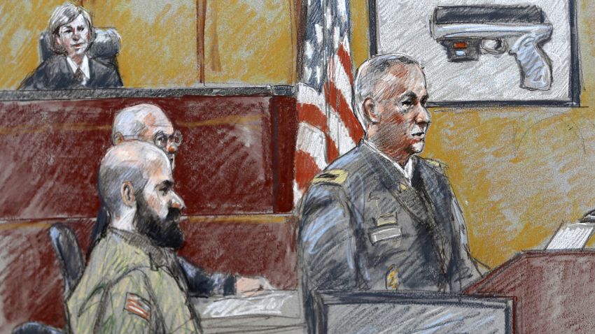 This courtroom sketch shows military prosecutor Lt. Col. Steve Henricks, right, speaking as Nidal Malik Hasan, center, and presiding judge Col. Tara Osborn look on, during the court-martial on Tuesday, August 6.