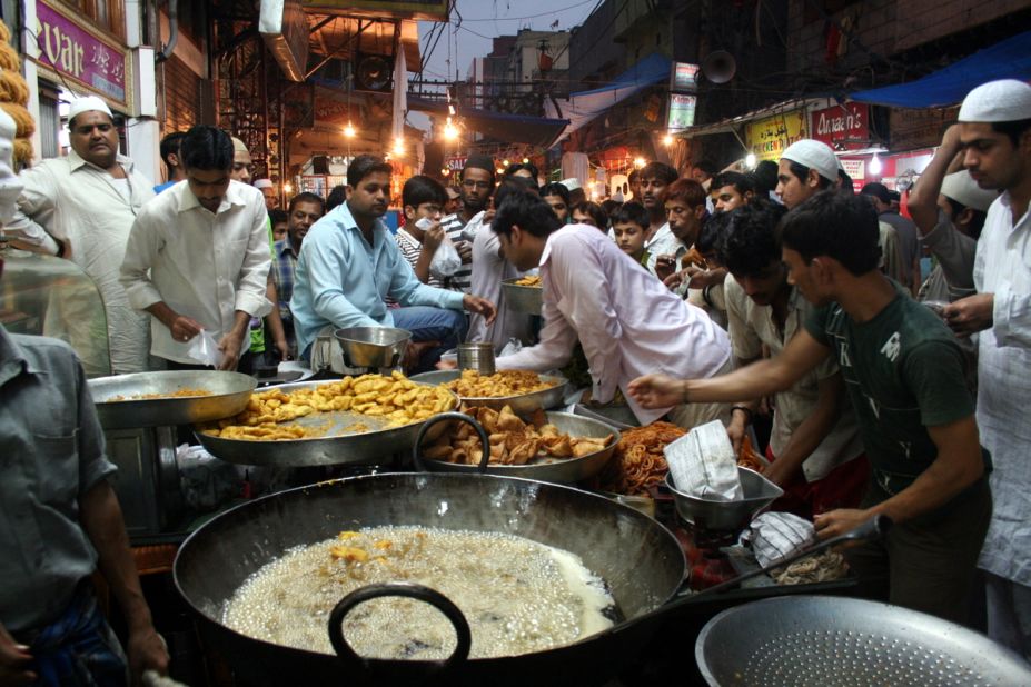 The hustle and bustle of the <a href="http://ireport.cnn.com/docs/DOC-1012895" target="_blank">Matia Mahal bazaar</a> close to Old Delhi's principal mosque Jama Masjid was captured on film by 70-year-old Ramesh Lalwani. The samosas are in the process of being fried and the pakoras, jalebis and gulab jamuns are ready for sale to the Eid crowds. 