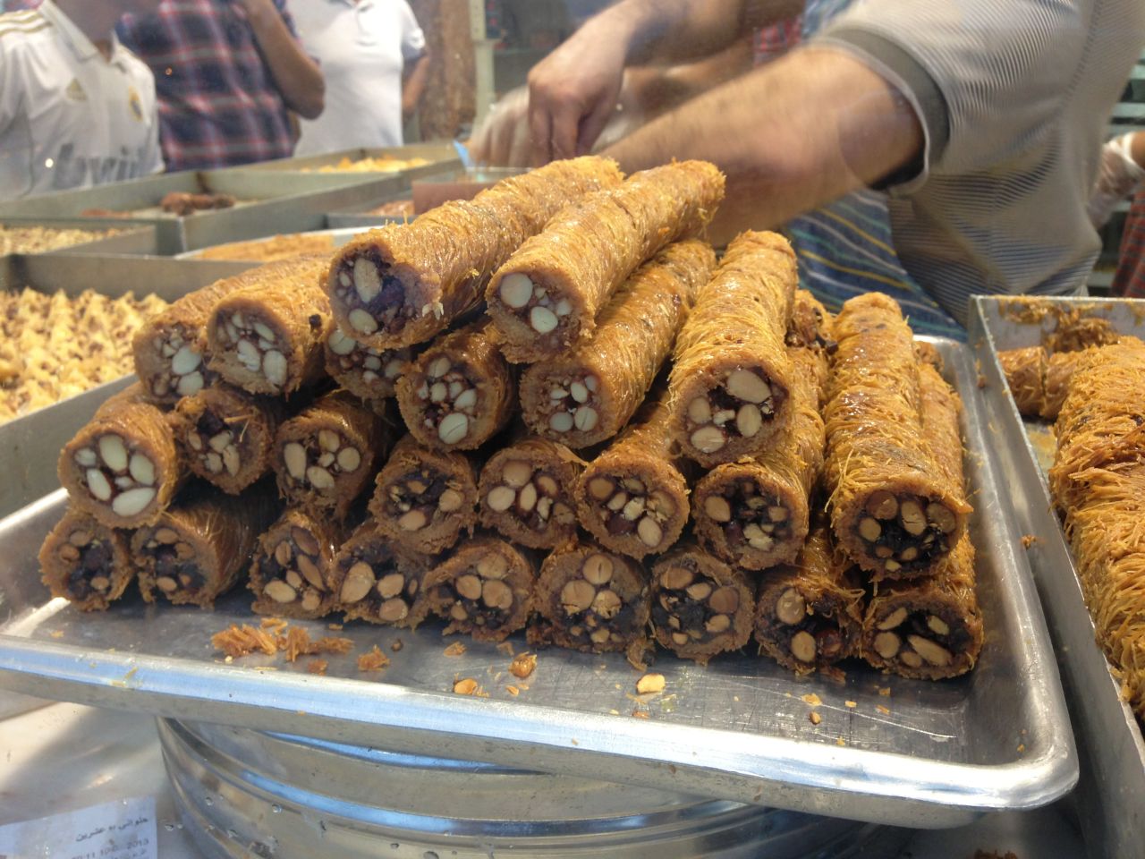 Sammi Addahoumi, 30, from South Carolina snapped this photo of a Benghazi sweet shop while traveling through <a href="http://ireport.cnn.com/docs/DOC-1012424" target="_blank">Libya</a> for Ramadan. "Sweets, especially during Ramadan, offer a guiltless pleasure that all of Benghazi can indulge in," he said. The sweets in this photo are called Kunafah and are filled with almonds, pistachios, hazelnuts, cashews, cheese, cream, or cream cheese.