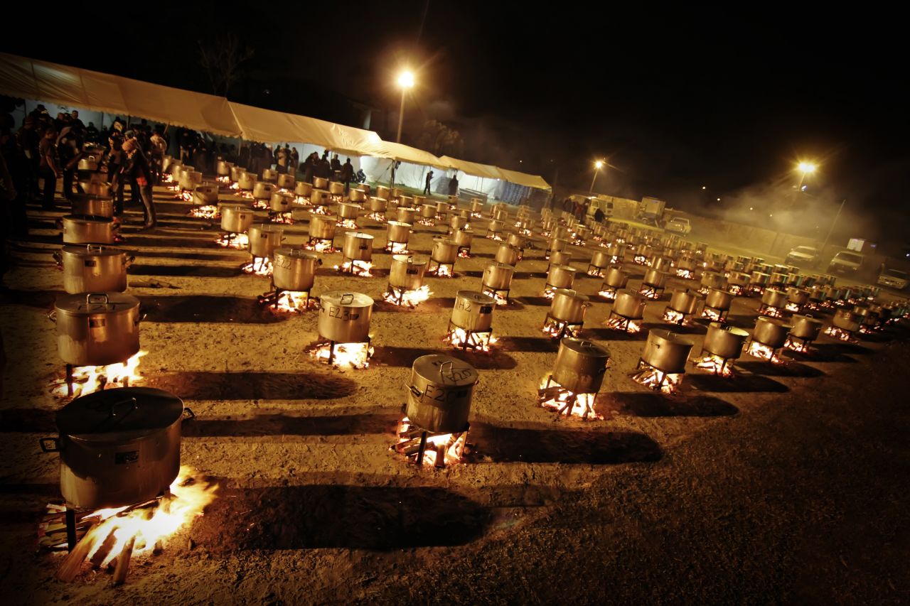 The night cooking at the Nakhlistan Eid-al-fitr Feeding Scheme in <a href="http://ireport.cnn.com/docs/DOC-1013607" target="_blank">Cape Town, South Africa</a> was captured by Amien Phillips. More than 69,000 people were fed and five tons of meat, four tons of rice, 2.7 tons of potatoes, 850 kilograms of onions, 27,000 pieces of wood and 151 pots were used.