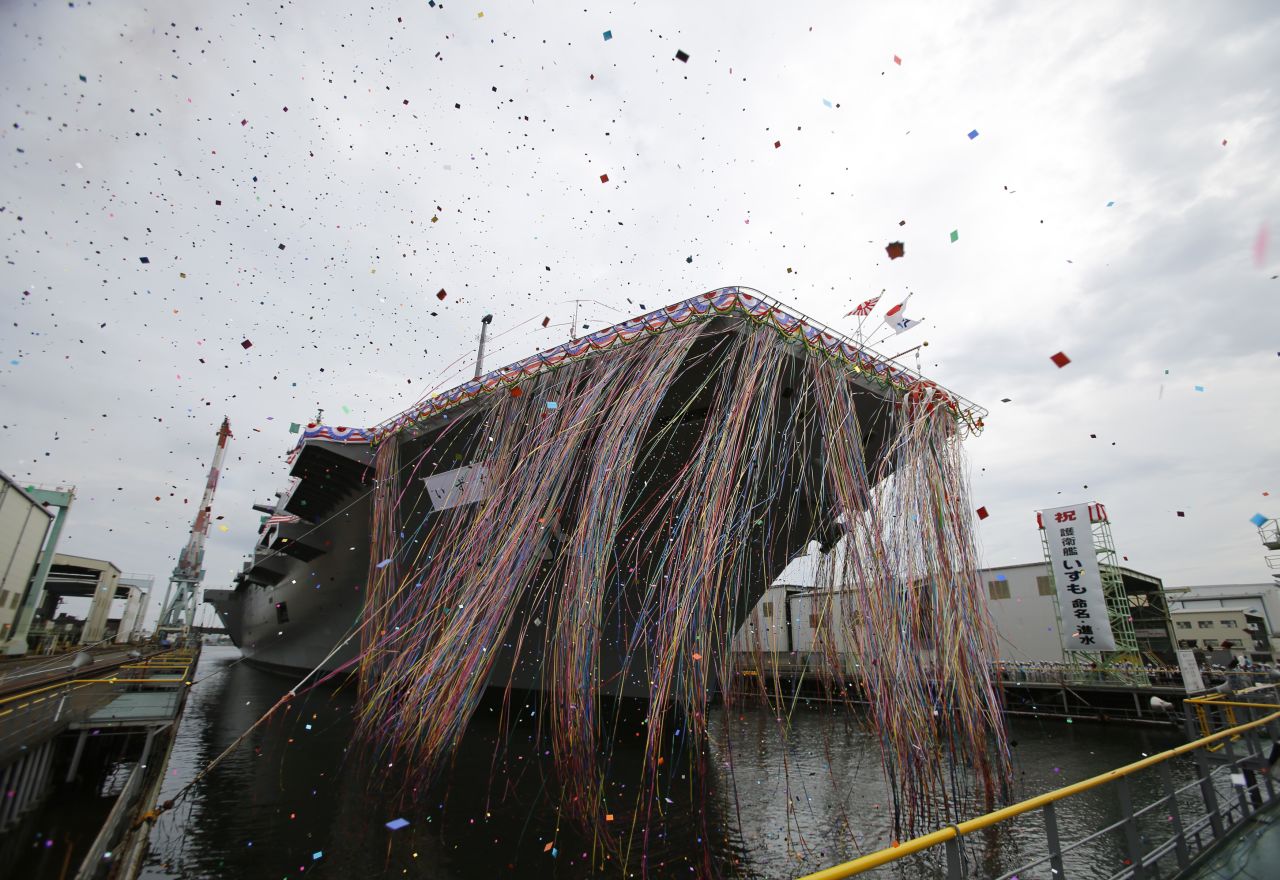 Confetti fills the air in Yokohama during the launch ceremony for the Izumo.