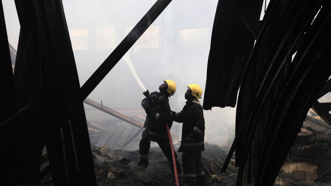 Firefighters work to put out the blaze on August 7.