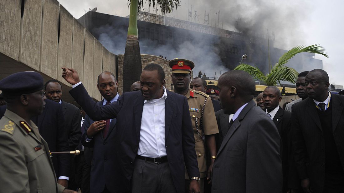 Kenyan President Uhuru Kenyatta visits the Nairobi airport on August 7 to check out the damage. The blaze could have a huge impact on Kenya's tourism and commerce.