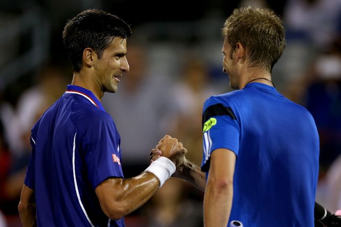Novak Djokovic was all smiles after thumping Florian Mayer 6-2 6-1 in his first match since Wimbledon. Djokovic saved all seven break points he faced. 