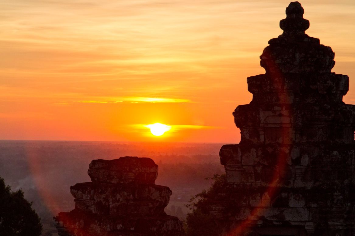 Phnom Bakheng is a popular place for viewing its larger neighbor, Angkor Wat, at dusk.