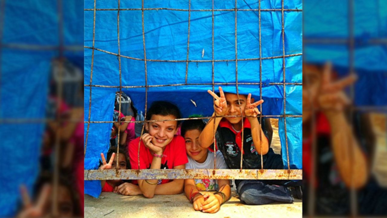 This photo of <a href="http://statigr.am/viewer.php#/user/42266969/" target="_blank" target="_blank">Syrian refugee children</a> was taken last year at the Hatay's Yayladağı refugee camp in Turkey by TV journalist Can Hasasu. "Eid, or Bayram as we call it in Turkey, is like Christmas for children, a cheerful feast. They collect money and gifts. Families buy new clothes for them. It was sad to see these children behind the fences of the camp. No money, no new clothes, no gifts and for some no family anymore. Despite all the sufferings in their country these children were smiling," said the 36-year-old from Istanbul.