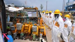 This photo taken on August 6, 2013 shows local government officials and nuclear experts inspecting a facility to prevent seeping of contamination water into the sea at Tokyo Electric Power's (TEPCO) Fukushima Dai-ichi nuclear plant in Okuma, Fukushima prefecture.