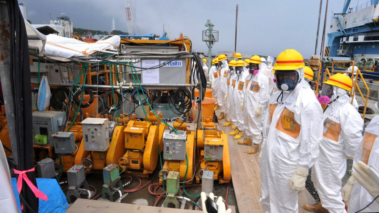 Officials and nuclear experts inspect a facility at Tokyo Electric Power's Fukushima Dai-ichi nuclear plant, August 6, 2013.