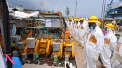 This photo taken on August 6, 2013 shows local government officials and nuclear experts inspecting a facility to prevent seeping of contamination water into the sea at Tokyo Electric Power's (TEPCO) Fukushima Dai-ichi nuclear plant in Okuma, Fukushima prefecture.