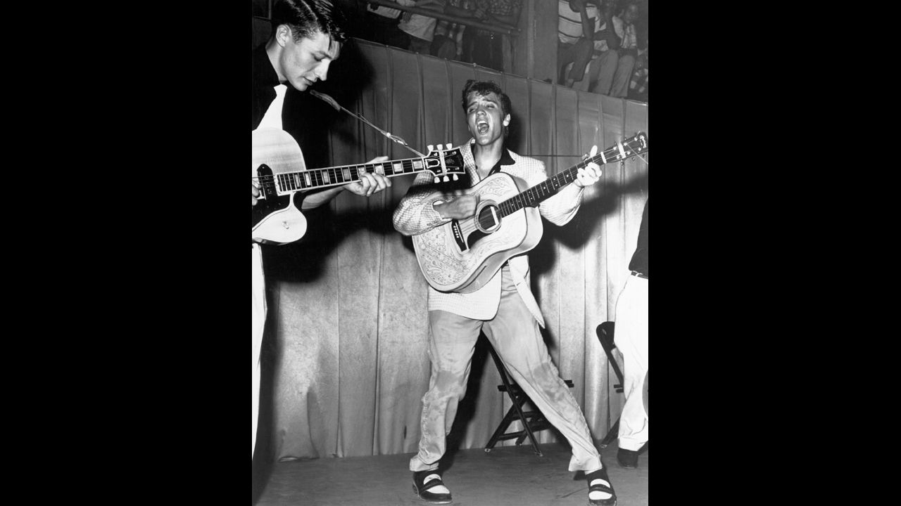 The rock 'n' roll singer performs in Tampa, Florida, with his brand new Martin D-28 acoustic guitar on July 31, 1955.