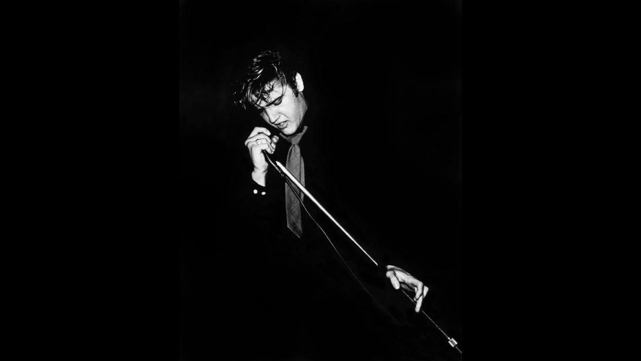 Elvis performs in 1956.