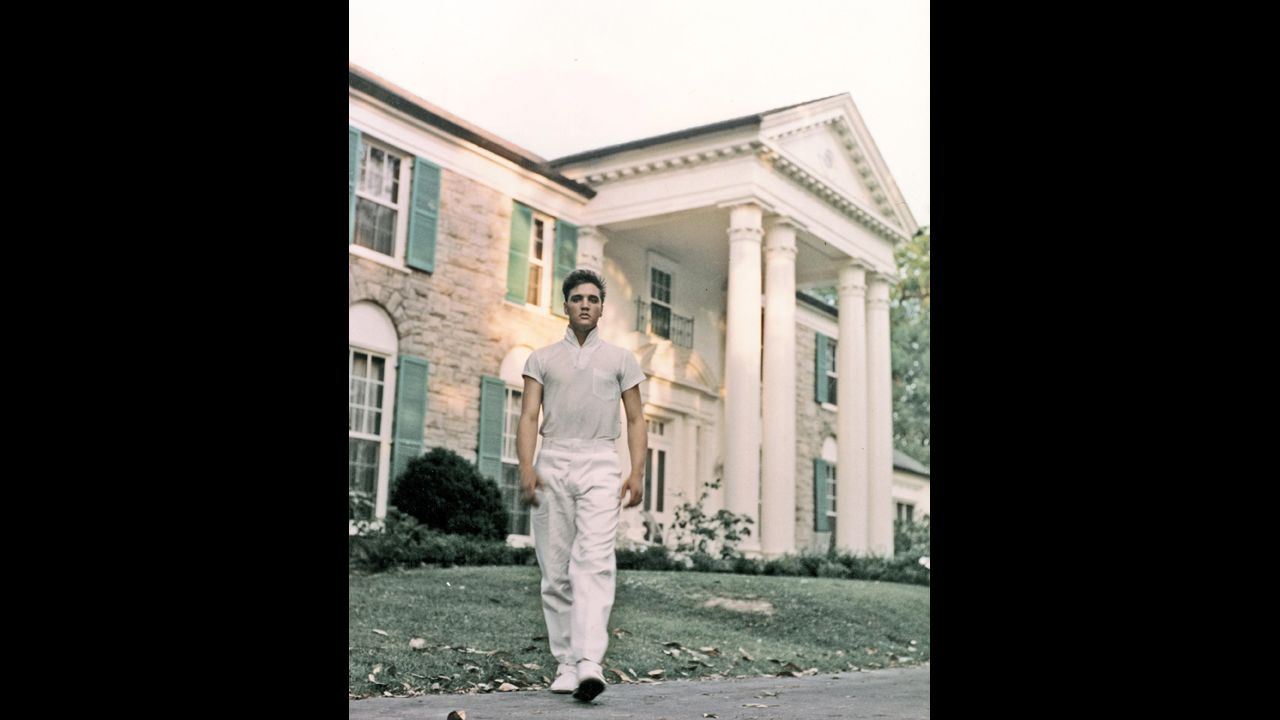 Elvis walks the grounds of Graceland in 1957. 