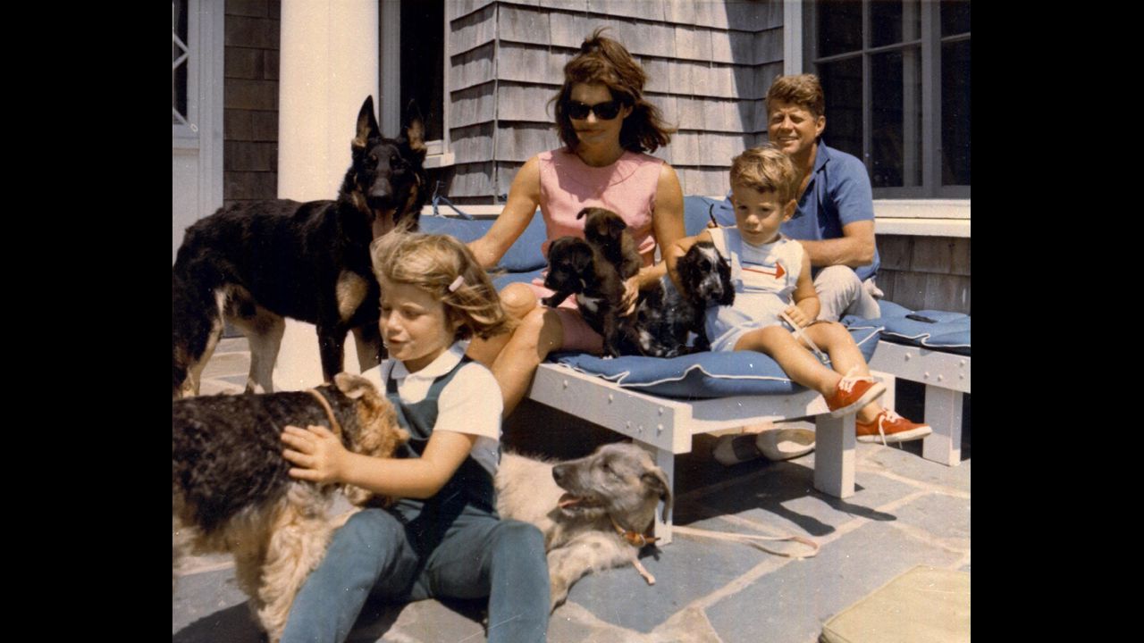 President John F. Kennedy vacations with his family in this undated photo. From left is daughter Caroline, first lady Jacqueline and son John Jr.