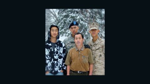 Kham Xiong (in Army beret)  with his father and brothers.