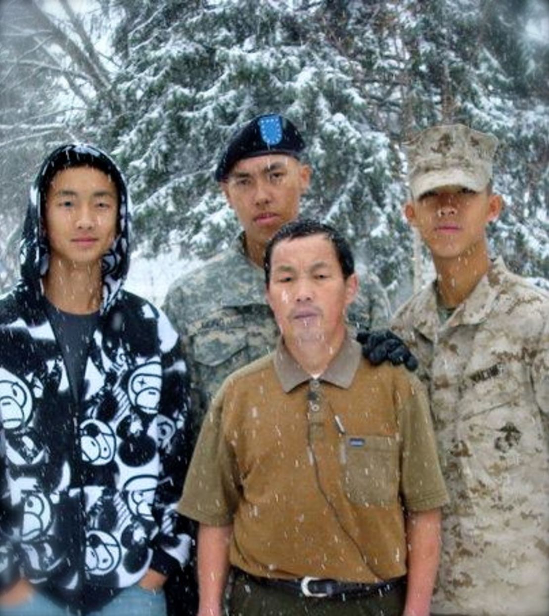 Kham Xiong (in Army beret)  with his father and brothers.