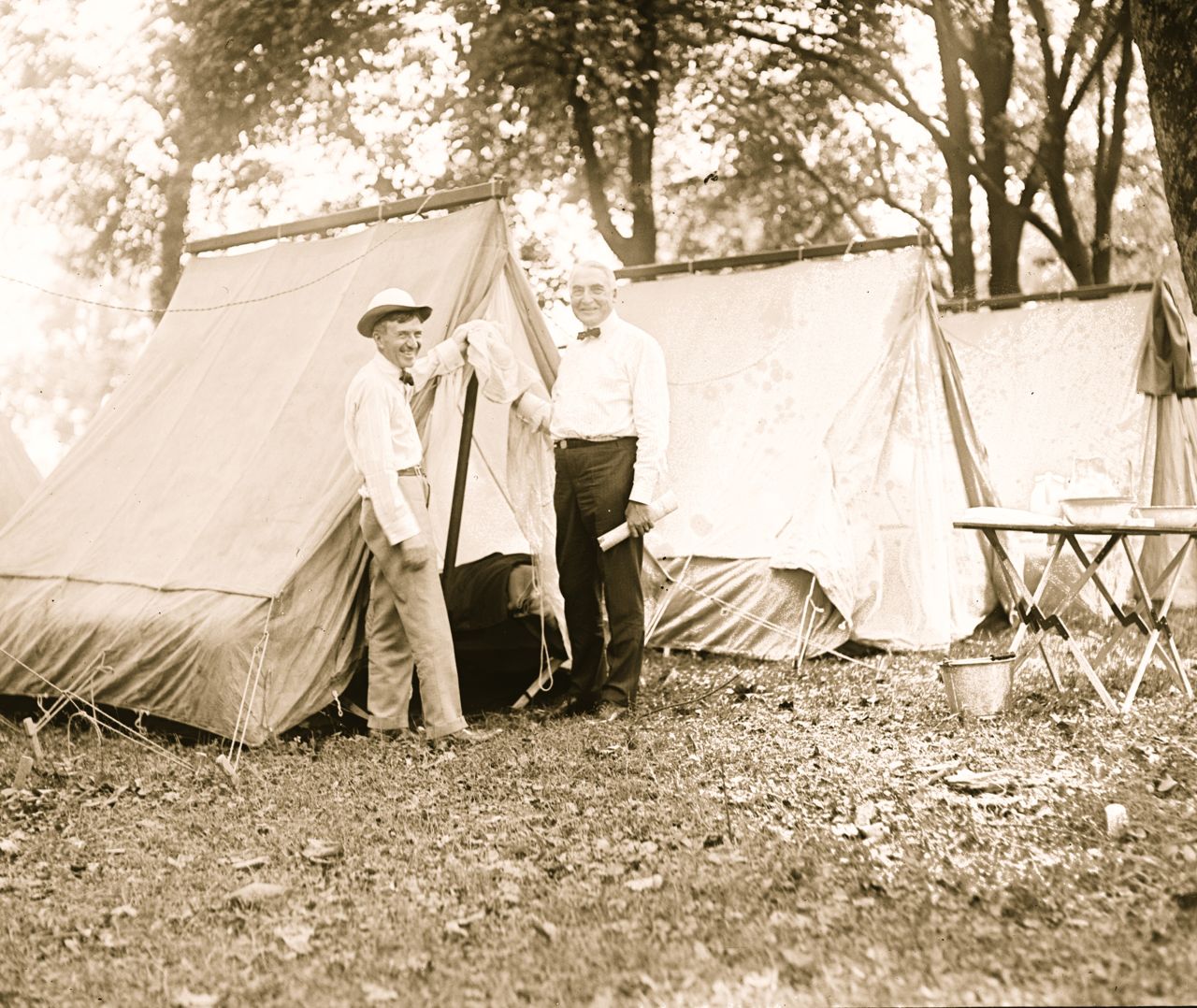 President Warren Harding, right, goes camping with Firestone Tire founder Harvey Firestone in 1921.