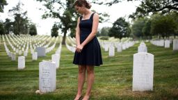 Alison Spann visits her father's grave at Arlington. (EVELIO CONTRERAS/CNN)