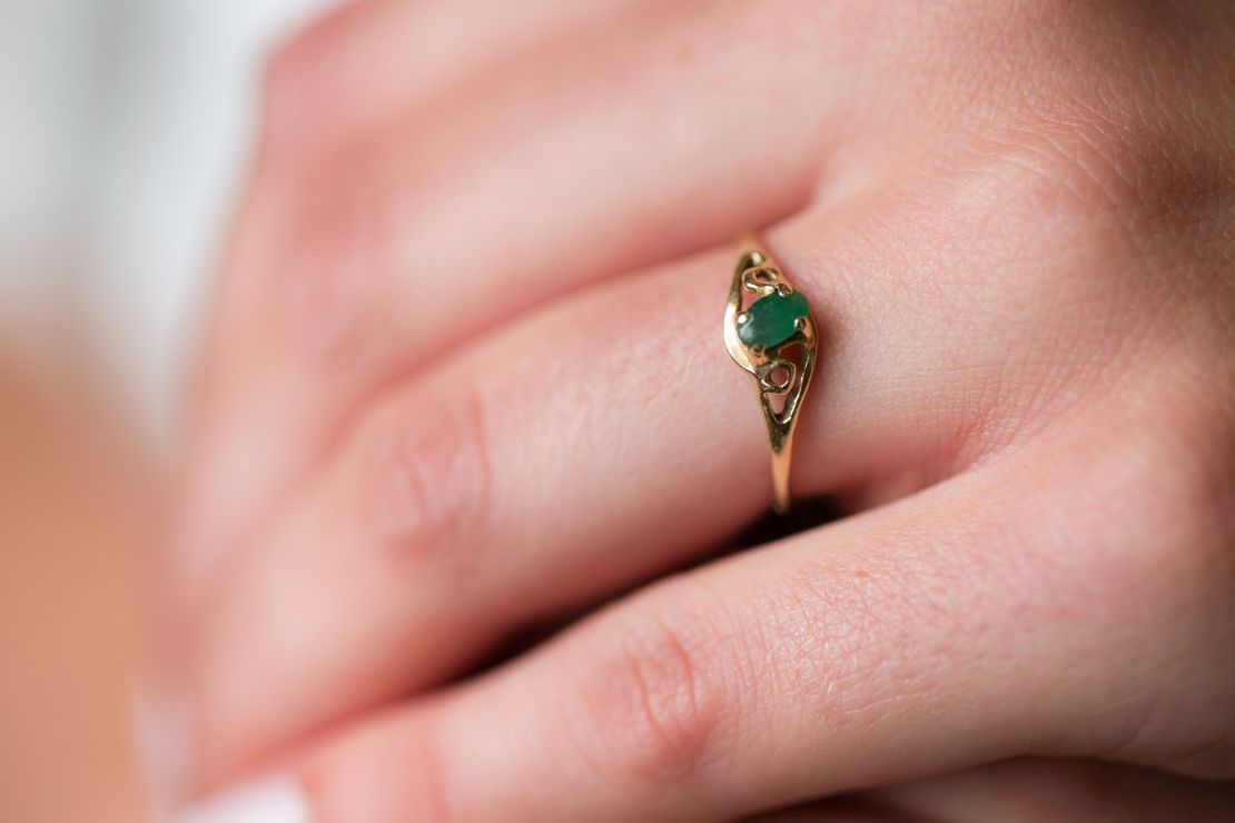 Alison Spann wears a ring her father had made for her mother. EVELIO CONTRERAS/CNN