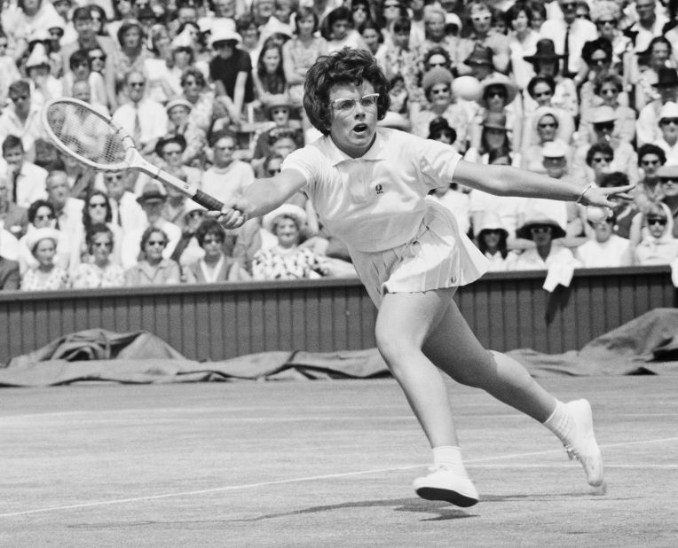 Former tennis player Billie Jean King (C) is joined by cast