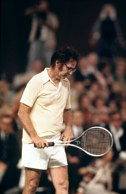 The 55-year-old Bobby Riggs cuts a forlorn figure as he slips to defeat against King in the famous "Battle of the Sexes" at Houston in 1973. 