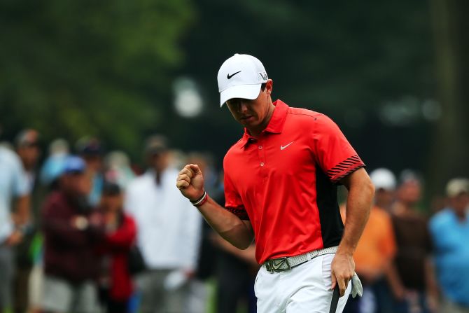 Defending champion Rory McIlroy battled back after a poor start to this second round to keep his title defense alive.