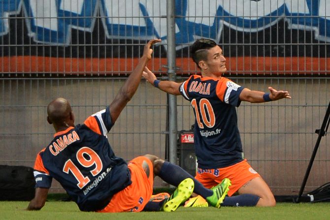 Montpellier's French midfielder Remy Cabella celebrates his opening goal of the Ligue 1 campaign against reigning champions Paris St German. 