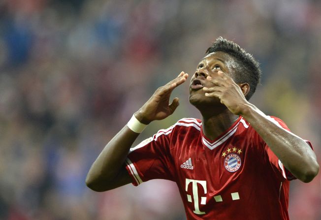 David Alaba celebrates scoring his side's clinching third goal from the penalty spot in the 3-1 win over Borussia Moenchengladbach.