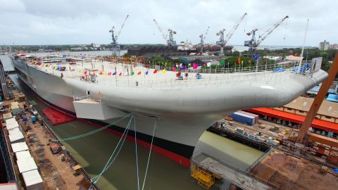 The INS Vikrant docks at the Cochin Shipyard on Sunday, August 11. It can carry MiG 29K fighters and light combat aircraft, a defense spokesman says.