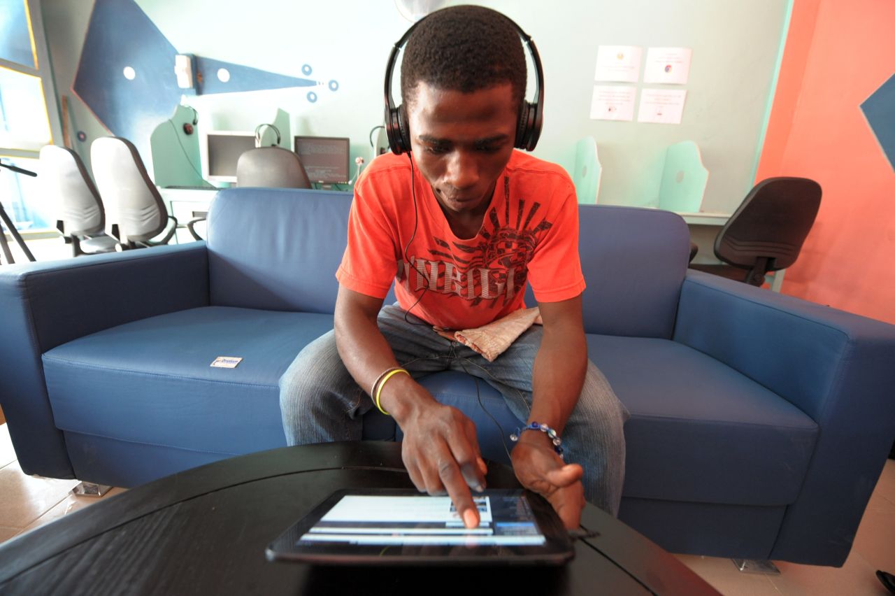 A client uses a tablet computer in the world's first cybercafe equipped with tablet computers, in the Medina, a popular district of Dakar. "Dakar is a good jumping off point into Francophone sub-Saharan Africa and due to the large number of international companies headquartered there for central and west Africa, many have global connections that can take their startups to the next level," Squibb said.