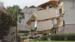 A 60-foot-wide sinkhole formed under a resort in central Florida late on Sunday, August 11, forcing guests out of their rooms as one three-story building collapsed and another slowly sank.