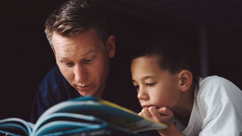 Tell little ones a bedtime story or talk to older kids about their day.