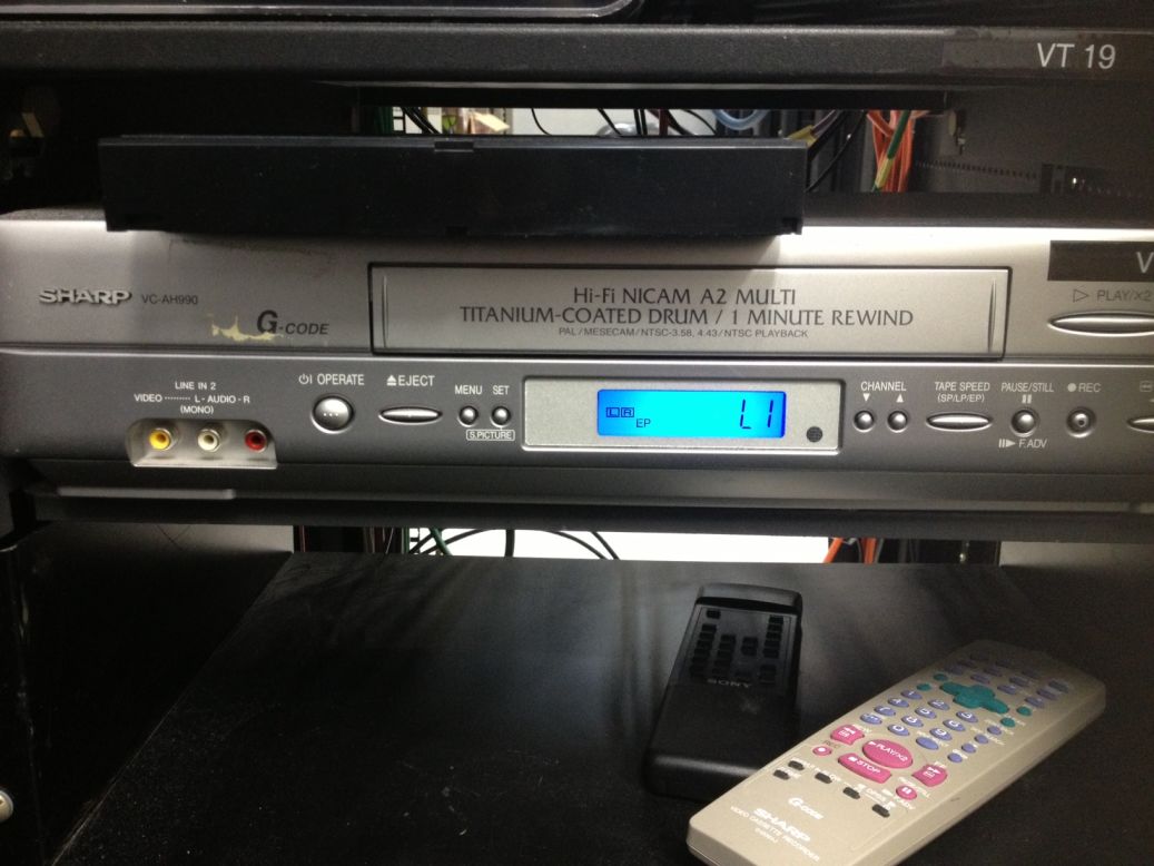 The clunky plastic cassettes would sometimes tangle in the machine and, over time, stretch to produce warped purple colors on the TV. But boy, did we love VCRs and video nights. And boy, did we hate programming them.