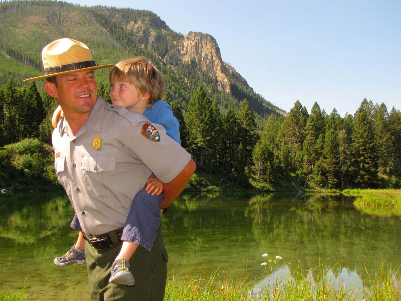 Meet our Yellowstone National Park ranger, Dan Hottle, and his 4-year-old son, Calder, shown here at Joffe Lake near the park's headquarters in Mammoth Hot Springs, Wyoming.