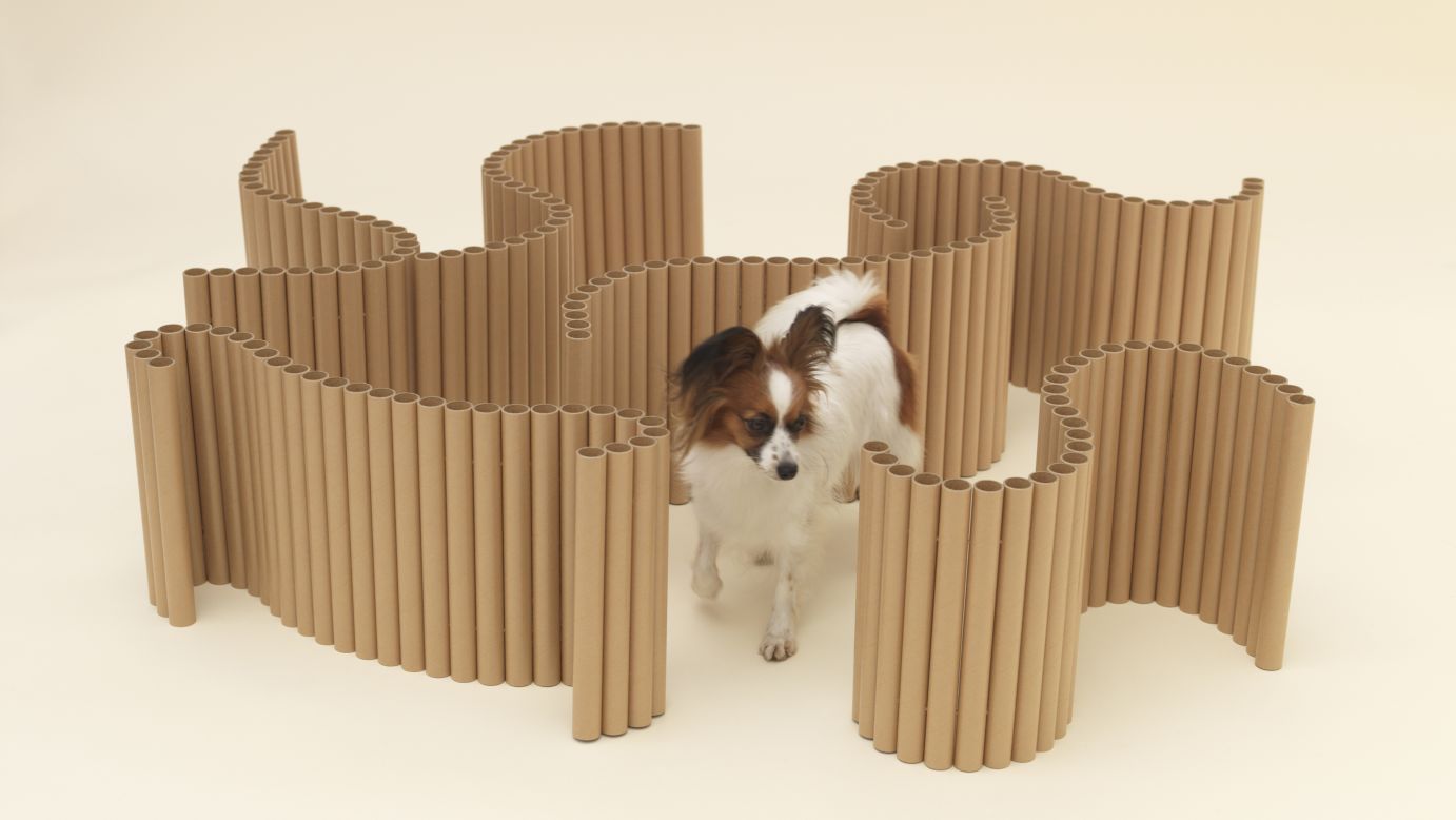 Shigeru Ban designed "Papier Papillon,"  a series of strung-together cardboard tubes that can be molded into a maze, a chair, a swing, a pen, even a coffee table. 