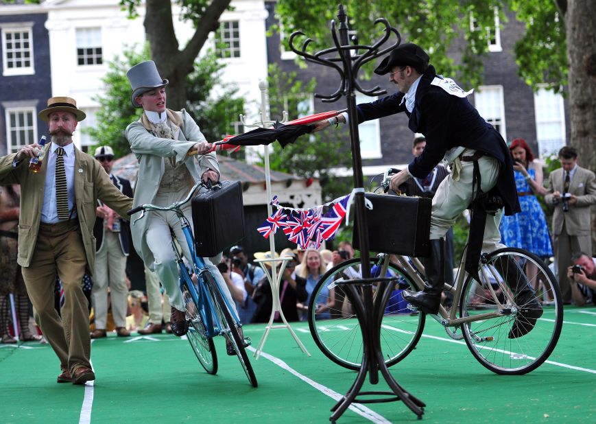 Brits parody their glory days while umbrella jousting at The Chap Olympiad, a tongue-in-cheek social sporting event set in London.