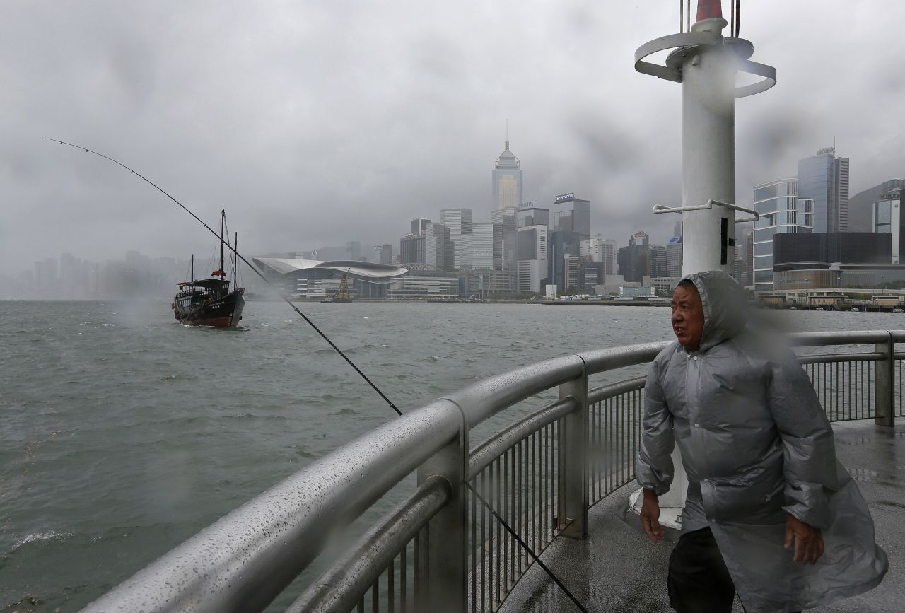 A fisherman battles a strong wind at Hong Kong's Victoria Habour on August 13. Typhoon Utor intensified as it moved toward the southern coast of China. The storm <a href="http://www.cnn.com/2013/08/12/world/asia/typhoon-utor/index.html">battered the northern Philippines</a> on Monday, killing at least one person and leaving 20 fishermen missing.