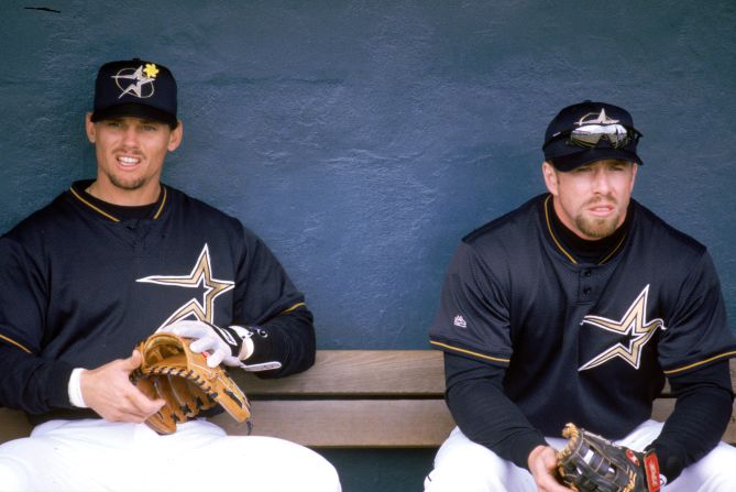 Craig Biggio, left, and Jeff Bagwell sit in the Houston Astros' dugout during the 1999 season. The Astros played their last game at the Astrodome on October 9, 1999, moving to the new Enron Field (now known as Minute Maid Park). 