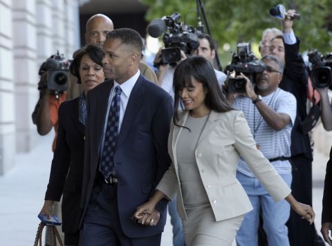 Former U.S. Rep. Jesse Jackson Jr. and his wife, Sandra, arrive at federal court in Washington for sentencing in August 2013. Jackson, a Democrat from Illinois, was sentenced to 30 months in prison for improper use of campaign funds, while his wife got 12 months for filing false tax returns.