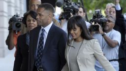 Former U.S. Rep. Jesse Jackson Jr. of Illinois arrives at federal court in Washington on Wednesday, August 14, 2013, with his wife, Sandi. Jackson was sentenced to 30 months in prison for misusing about $750,000 in campaign funds. Sandi Jackson received a 12-month sentence for filing false tax returns.