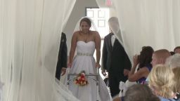 dnt paralyzed bride walks down aisle_00000327.jpg