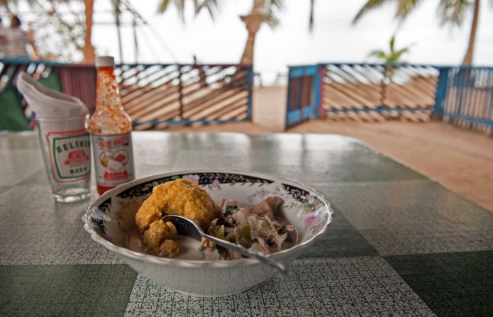 At Hopkins Village, several eateries offer traditional dishes in an effort to expose visitors to local cuisine. A typical offering is a plate of hudut -- fish cooked in a coconut broth and served with mashed plantains. No fork needed.