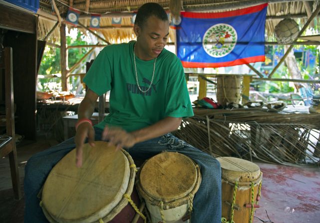 Against a backdrop of pelicans and fishermen at sea, Austin Rodriguez (next photo), 82, and his daughter have kept the drum-making tradition alive for close to 30 years. 