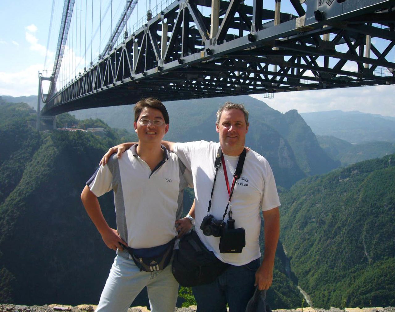 Eric Sakowski, right, a Los Angeles-based film and video producer, began his bridge obsession as a boy by reading the "Guinness Book of World Records." He started tracking lofty bridges on his own, eventually recording his research on<a href="http://highestbridges.com" target="_blank" target="_blank"> his website highestbridges.com</a>. Recently Sakowski has been touring China, along with Chinese bridge engineer Shijie Du.