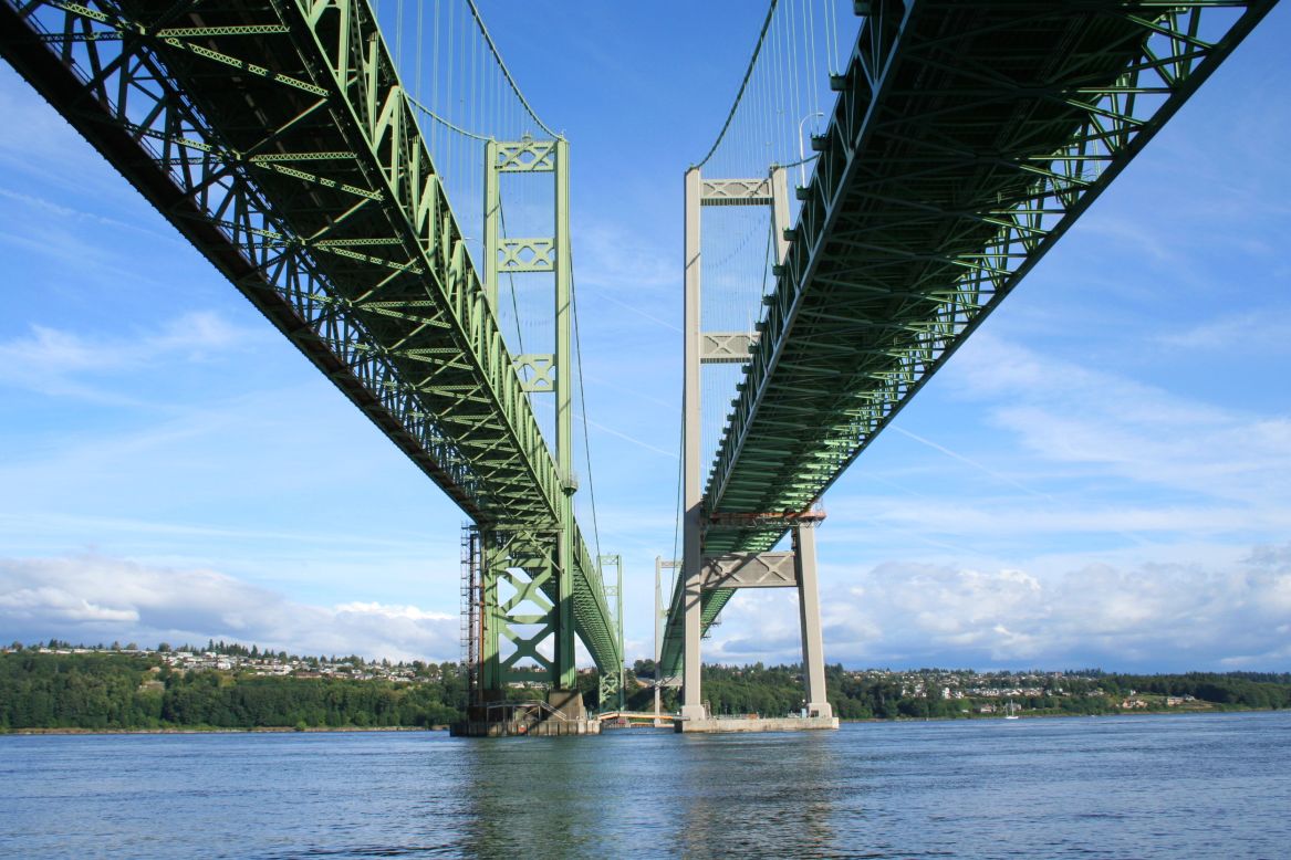 The double spanned Tacoma Narrows Bridge in Washington state has gone through many changes over the decades. The first version of the bridge collapsed in 1940 after the structure shockingly bent during 40-mph winds. A single span replacement was built in 1950.