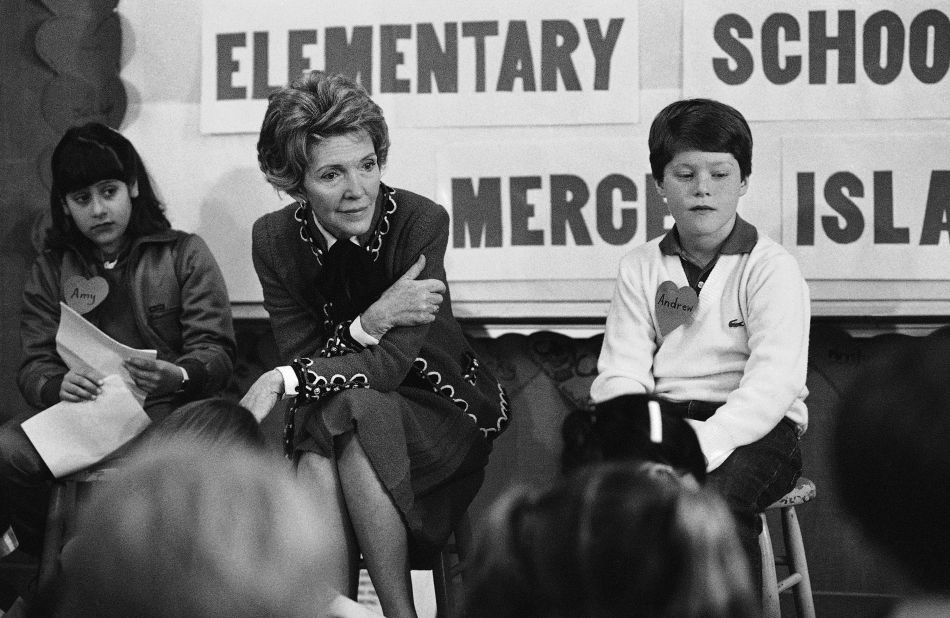 First lady Nancy Reagan participates in a drug education class at Island Park Elementary School on Mercer Island, Washington, on February 14, 1984. She later recalled, "A little girl raised her hand and said, 'Mrs. Reagan, what do you do if somebody offers you drugs?' And I said, 'Well, you just say no.' And there it was born." She became known for her involvement in the "Just Say No" campaign.