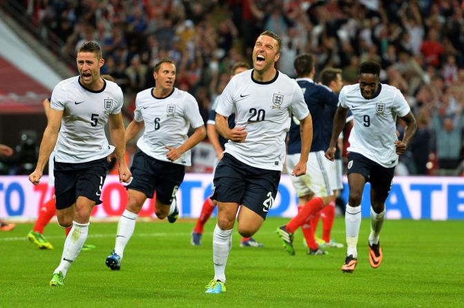 Winning feeling. Rickie Lambert scored on his debut for England in the 3-2 victory over Scotland at Wembley.