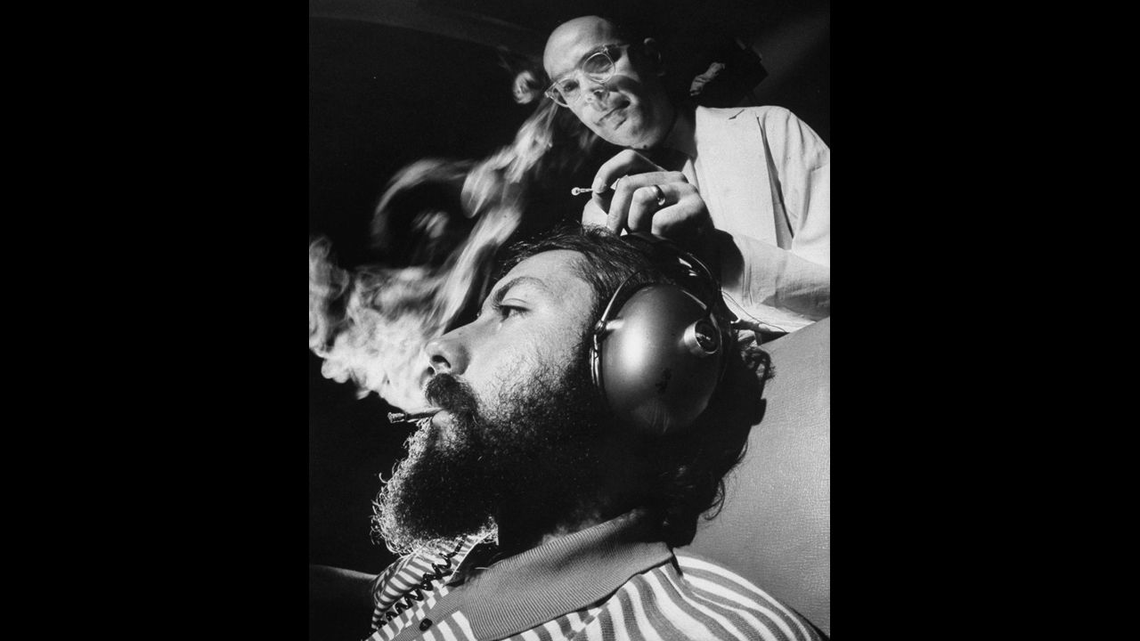 Research scientist Dr. Reese T. Jones, right, adjusts the electrodes monitoring a volunteer's brain response to sound during an experiment in 1969 that used a controlled dosage of marijuana. The tests were conducted at the Langley Porter Institute at the University of California, San Francisco.