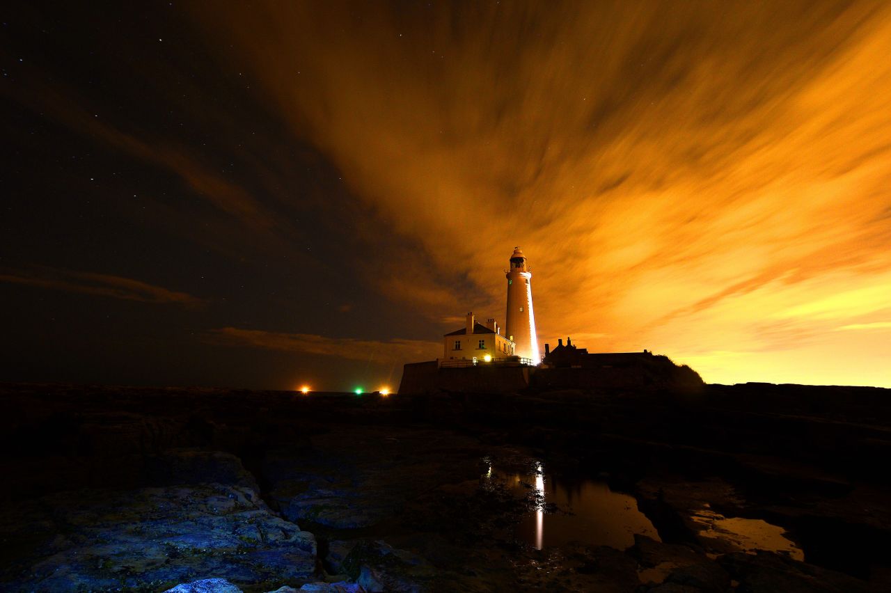 A starry sky is seen over St. Mary's Lighthouse, just north of Whitley Bay off the coast of Northeast England, in the early hours of the morning on August 14.