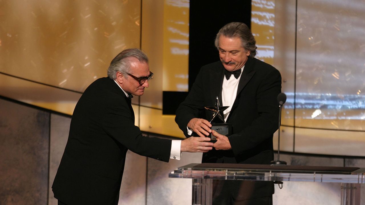 In 2003, Scorsese presents De Niro with the American Film Institute's 31st lifetime achievement award. 